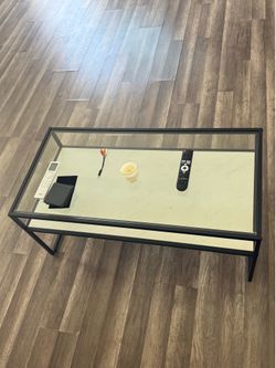 Modern Glass Coffee Table – Like New, Black Metal Frame