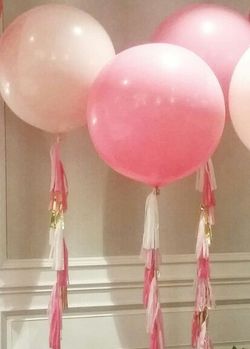 Floating balloons with long tassels