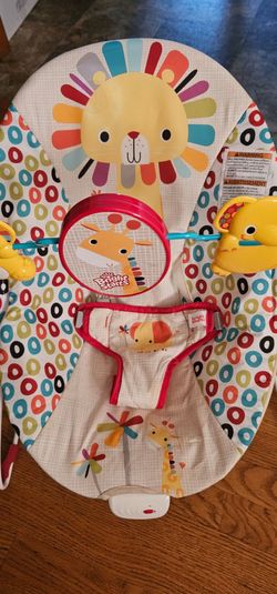 Bright Starts Playful Pinwheels Vibrating Baby Bouncer.