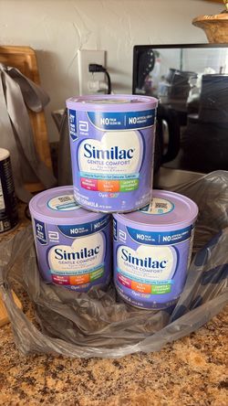 3 cans similac gentle comfort & 1 box Huggies diapers