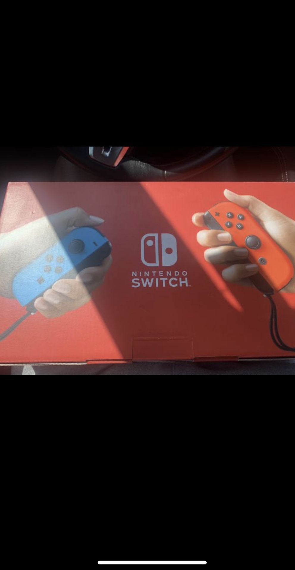 NEW Nintendo Switch with Neon Blue and Neon Red Joy‑Con Handheld Gaming Console