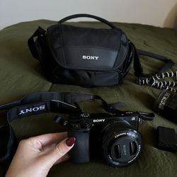 Sony Alpha a6000 Mirrorless Digital Camera w/ 16-50mm and 55-210mm Power Zoom Lenses Black Kit