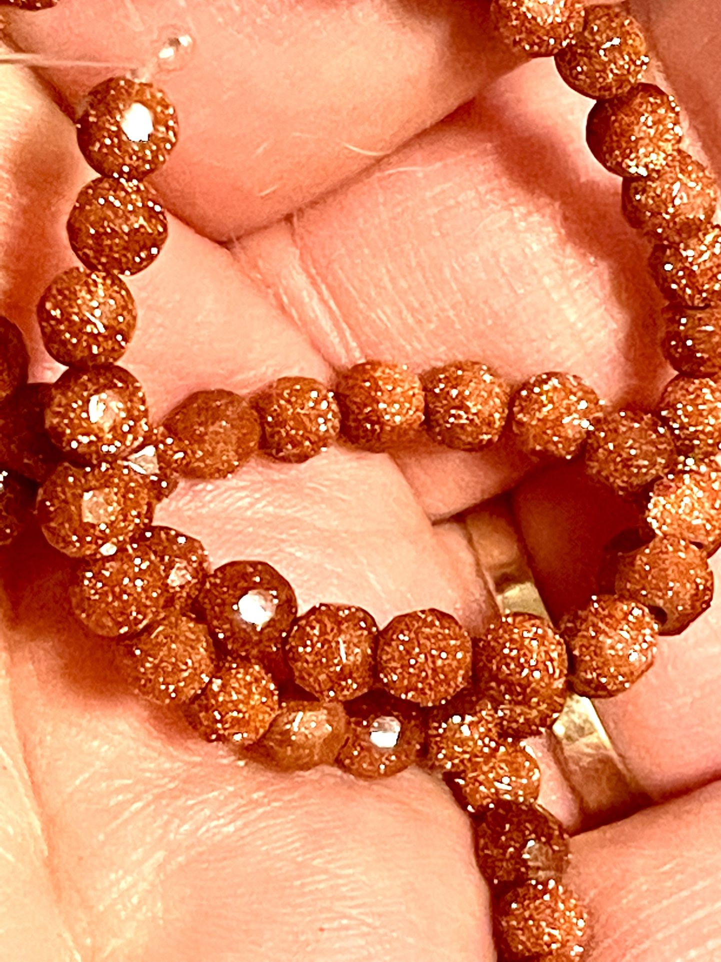 Strand Of Faceted Goldstone Beads