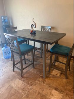 Grey table and 4 chairs