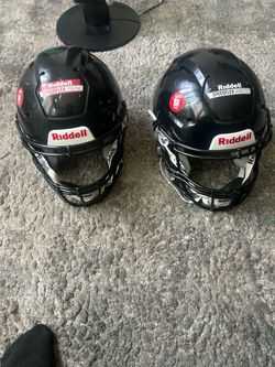 Brand new Riddell Helmets one Varsity Medium and one Youth Medium