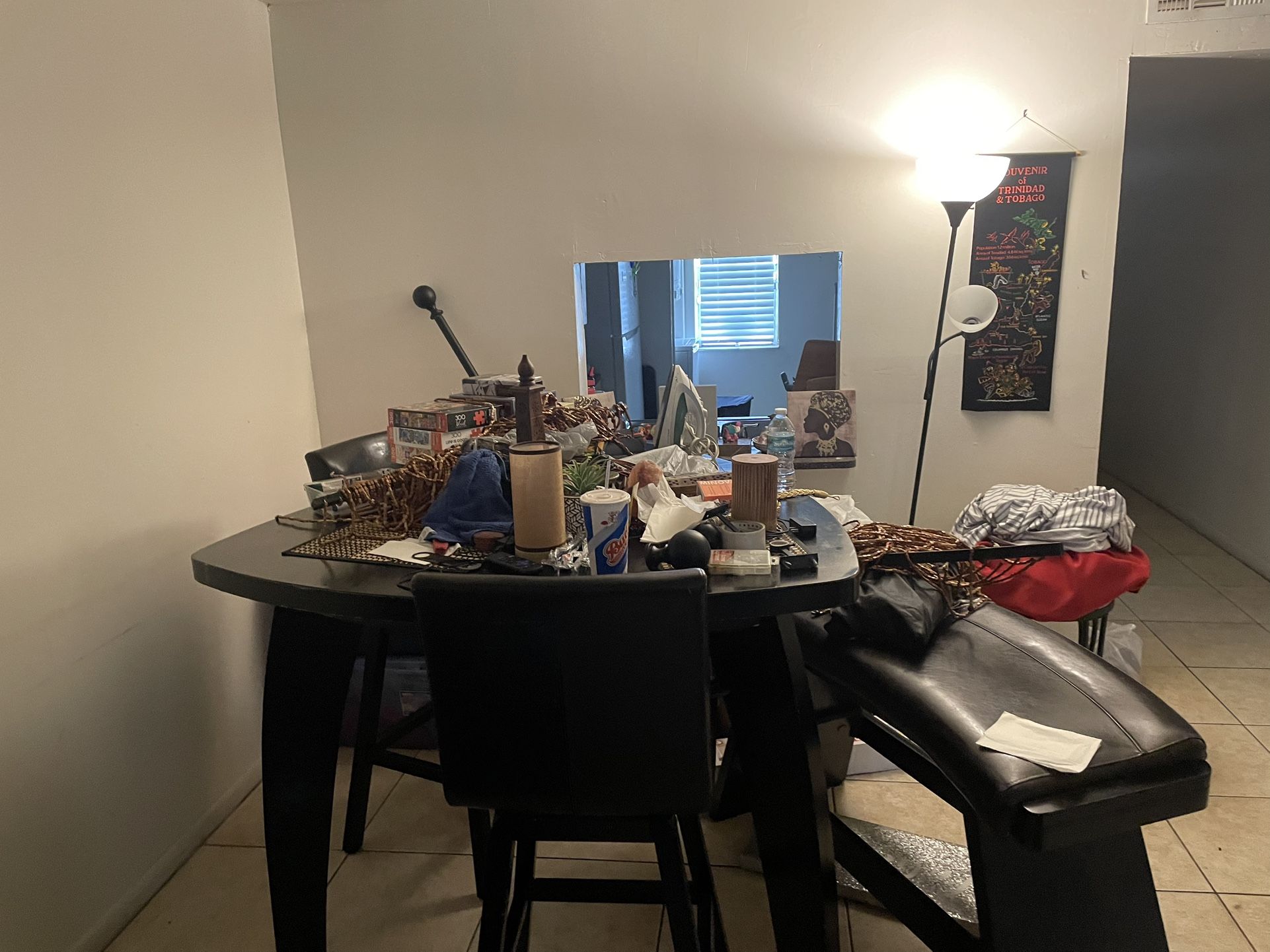 Blue Couch And High Bench Table