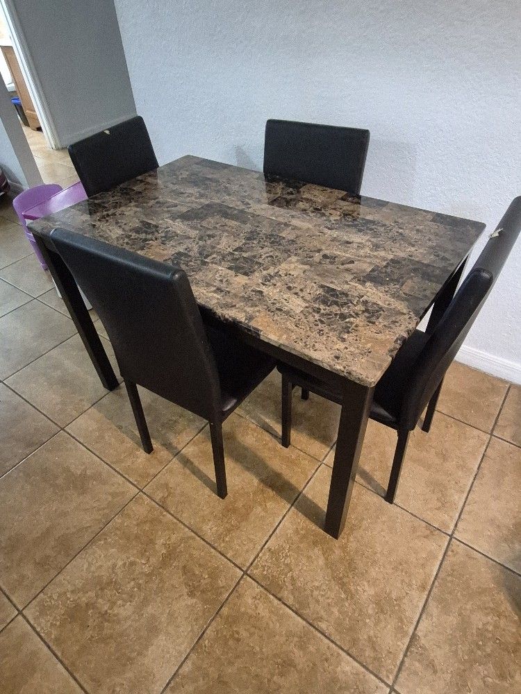 Table And 4 Chairs