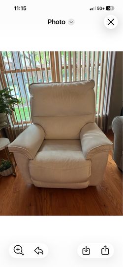Lazy boy. Cream color Rocker and swivel recliner chair