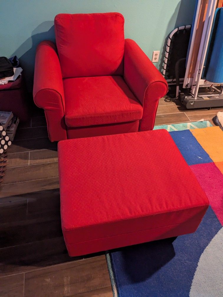 Red Armchair And Footstool
