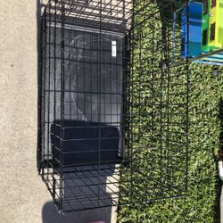 Two Medium Size Dog Kennels 