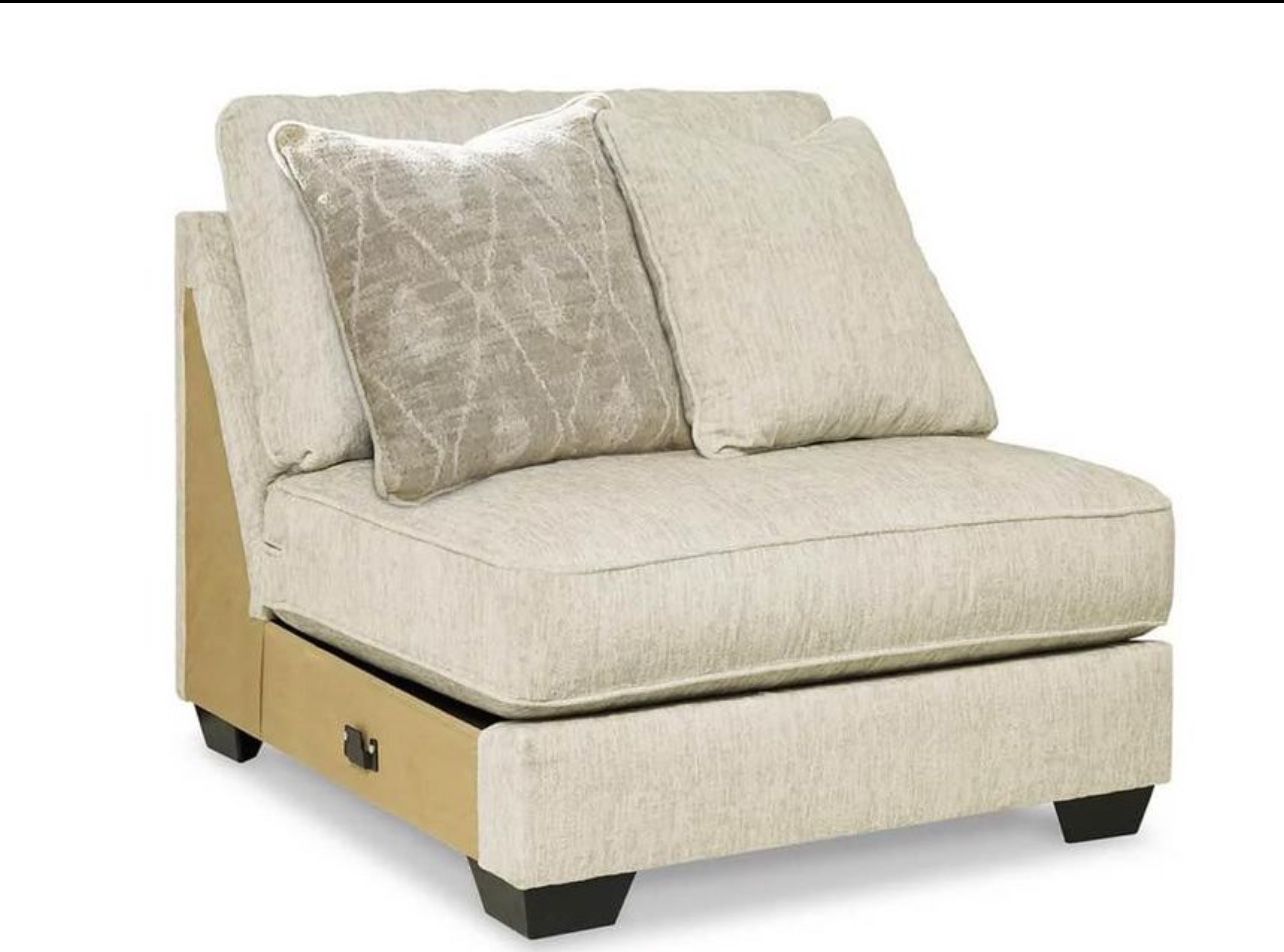 New Armlees Chair Sectional Piece from - Ashley Furniture