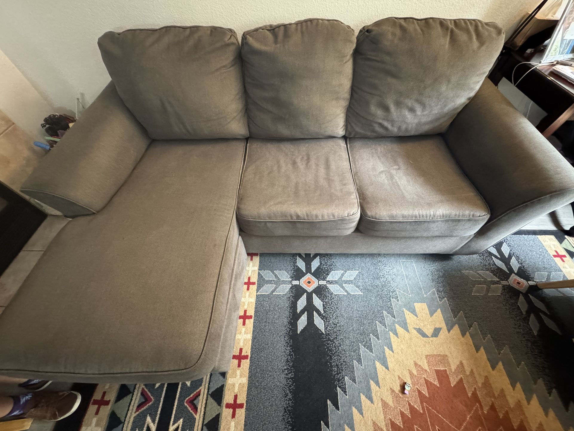 Grey Couch With clean sleeper