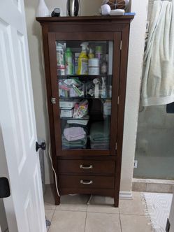 Bathroom supply cabinet