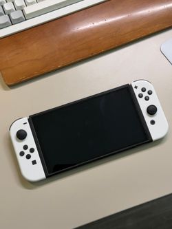 Nintendo Switch OLED (white) with dock, case and grip