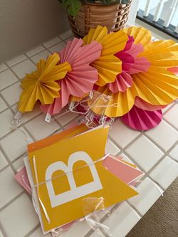 Happy Birthday sign and flowers