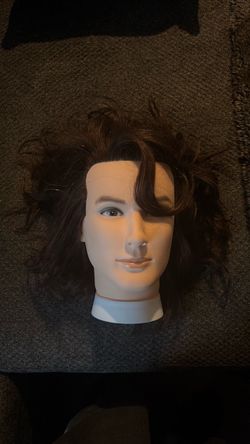 Male mannequin heads-barber practice