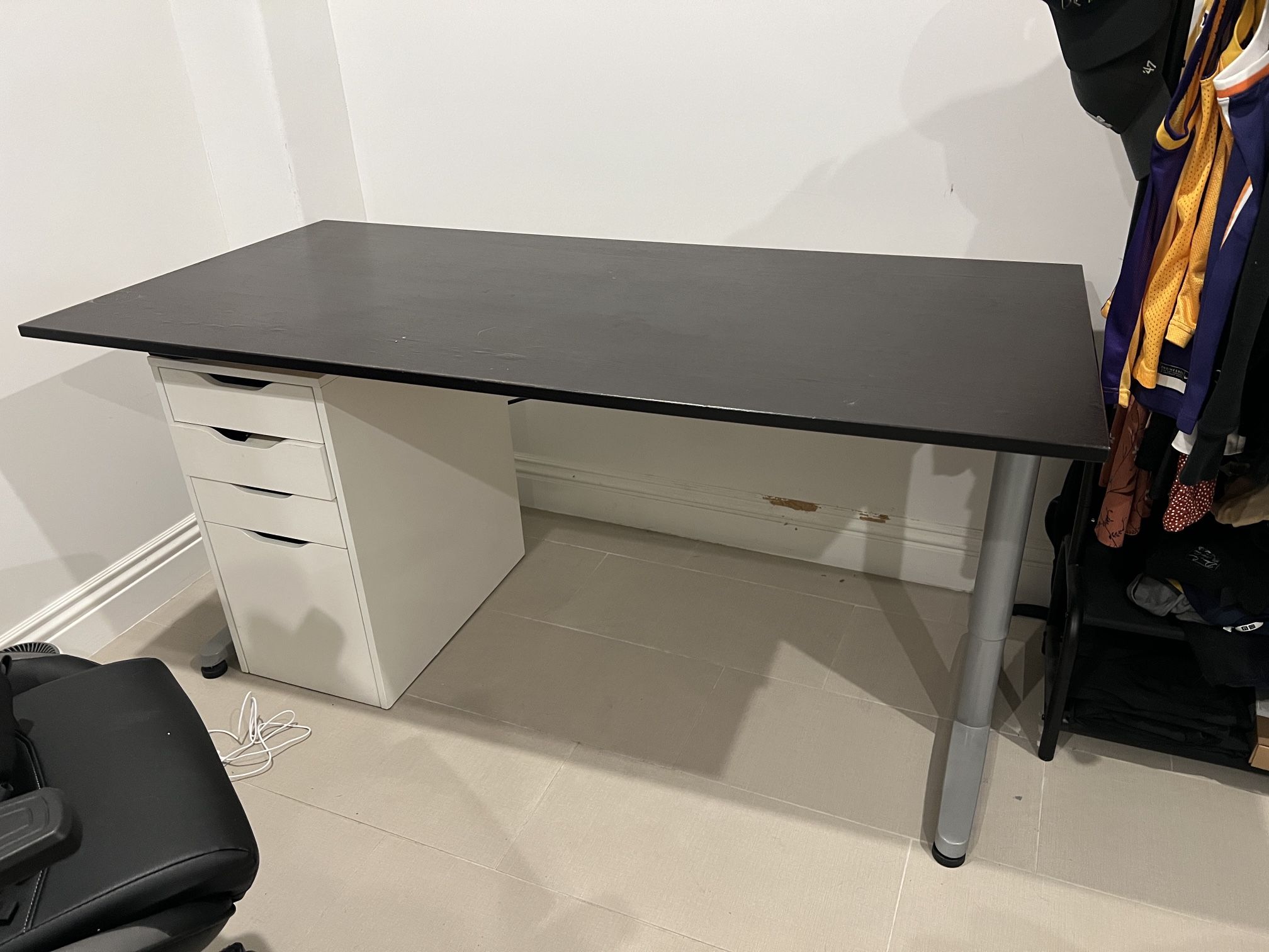 Desk with Outlet Plugs