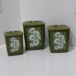 Set of Three Vintage Nesting Canisters with Daisies in Green Color