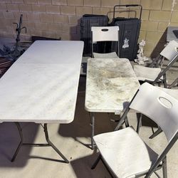 Lifetime folding banquet table and 4 chairs — $150. Small table — $40.