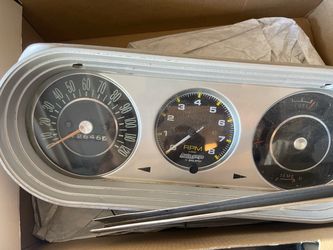 62-65 nova speedometer cluster with Autometer tach