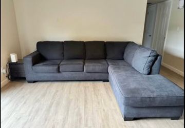 Ashley Sectional $250 – Breaks into 2 pieces, easy to move