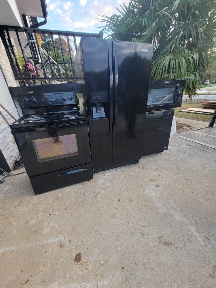 Used Whirpool Refrigerator, dishwasher, microwave and electric stove. 