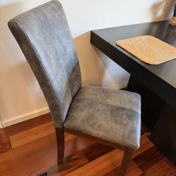 Two Leather Chairs