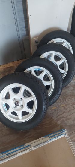Rines 14x6 Son 4x100 originales de miata marca Enkei Llantas seminuevas 195 60 14
