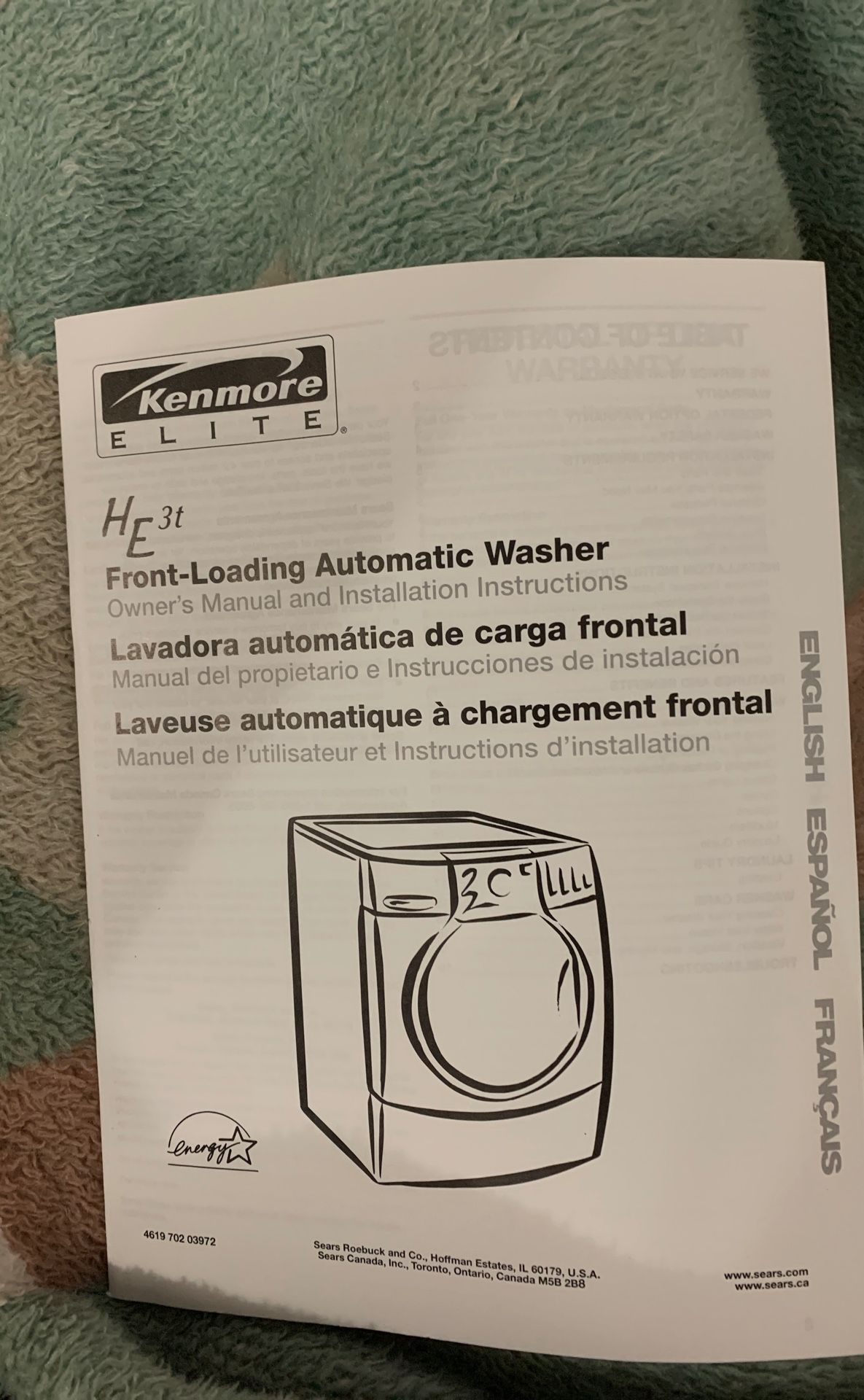 Kenmore Elite HE 3t front loading automatic washer color is Bisque or beige.