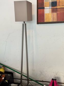 Tan and silver lamp