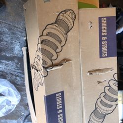 2014 nissan rogue front shock and spring assembly