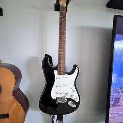 Black Fender Squier Strat Guitar 