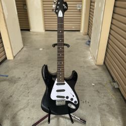 First Act Me1973 Electric Guitar incluye Base 