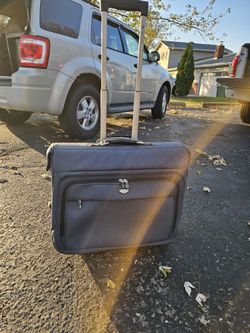Blue dockers rolling suitcase