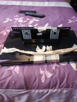 Tv stand an bracket it will hold up to 50inch tv
