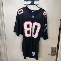 Vintage Russell Athletic Atlanta Falcons jersey featuring Andre Rison's name and number. Size L