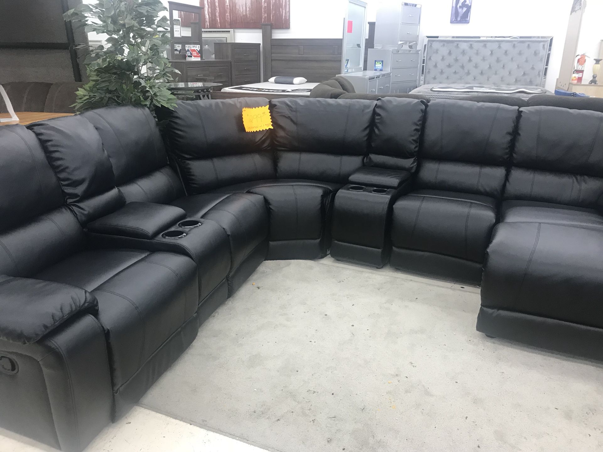 RECLINING SECTIONAL WITH CUPHOLDERS