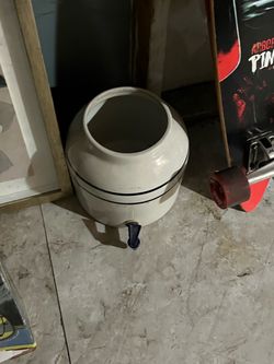 white ceramic water dispenser