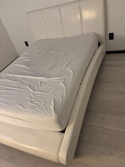 Full size bed , mattress, small dresser and lamp