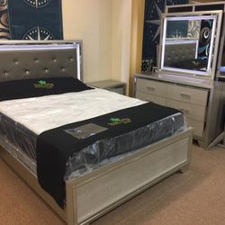 Lonnix Silver LED Upholstered Panel Bedroom Set (Queen and King Bed