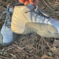 11c Jordan 12 Retro sneakers in a kids' "Wolf Grey Vivid Pink"