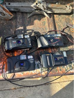 Bunch of simple 35mm film point and shoot cameras