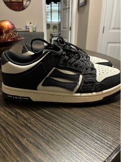 Amiri “Skel” low top  [men’s8.5- women’s 10]