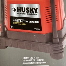 ESTATE SALE-  Battery Charger Husky Never Used In Original Box