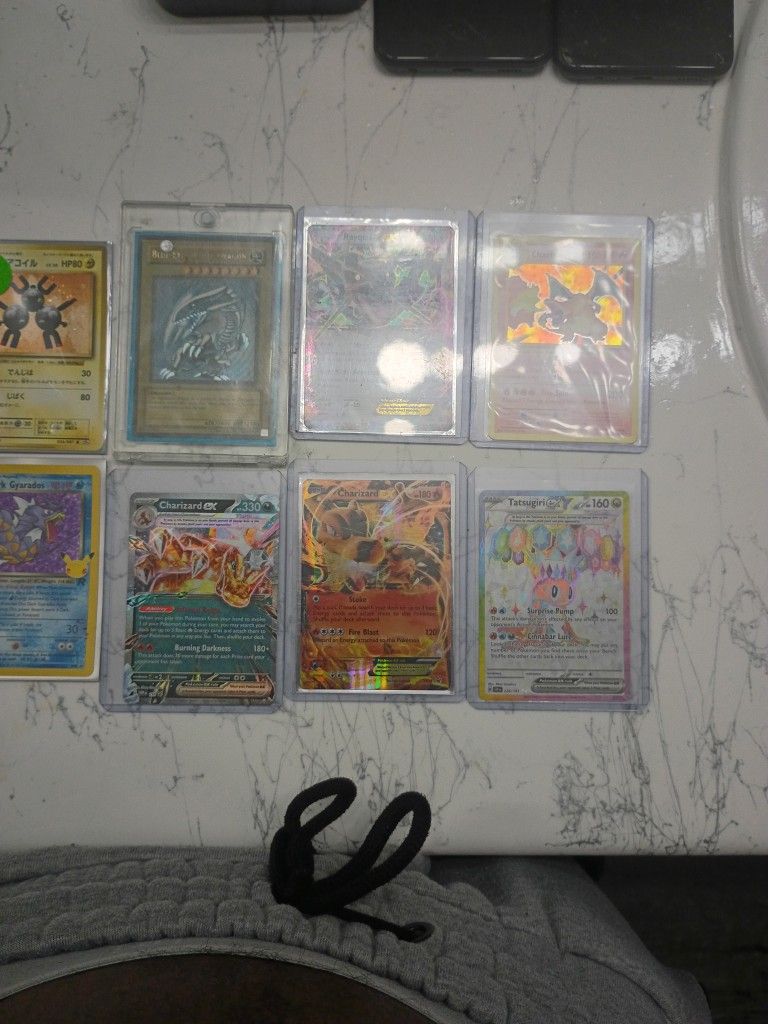 Pokemon And SDK-001 BLUE EYES WHITE DRAGON