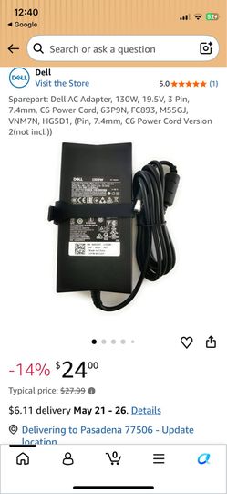 Dell 130W AC adapter, model DA130PE1-00, which is compatible with various Dell laptops.
