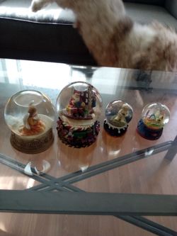 Four snow globes