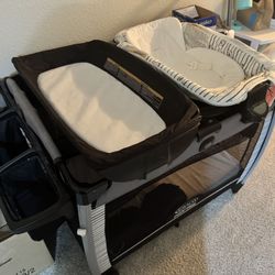 Grace Pack N Play With An Additional Mattress.