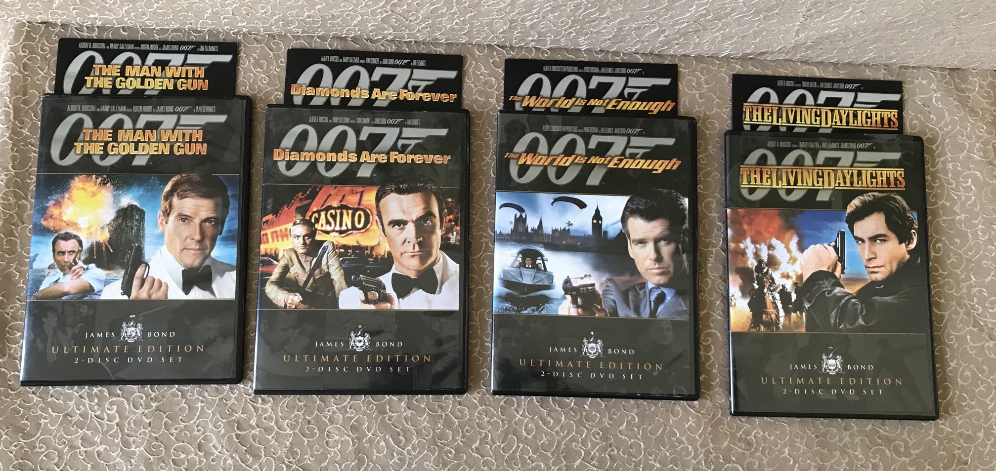 James Bond 007 dvd Movie collection 4 Movies Diamonds are Forever, The Man with The Golden Gun, The Living Daylights and The World is not Enough
