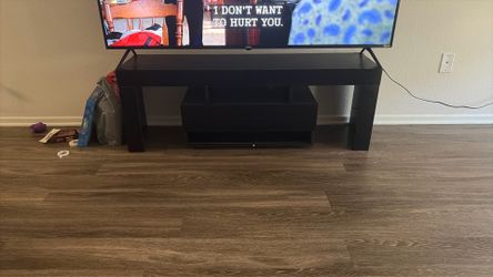 Tv stand up to 65” tv can fit